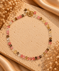 Collier en perles multicolores de quartz rose, quartz fumé, citrine et cristal de roche avec fermoir toggle doré